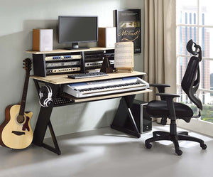Keep your recording studio space organized while you create musical masterpieces with the Annette music desk. Smaller in size yet still powerful, the dek can securely hold all your equipment and gear. The shelf can be used to mount a monitor and speakers.