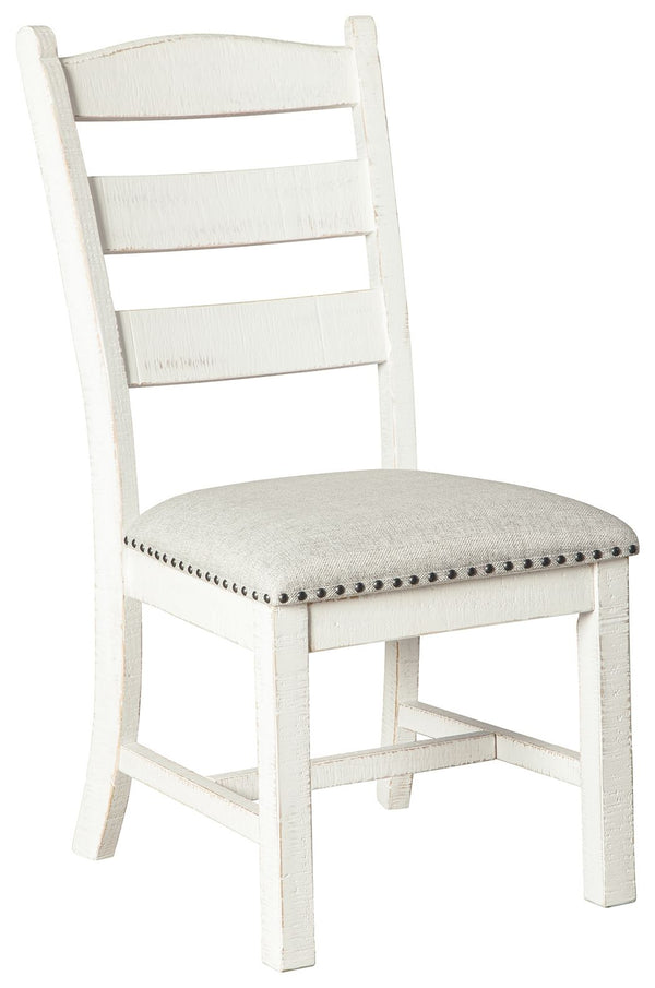 Whether youâ€™re pining for cottage charm or modern farmhouse sophistication, this dining room upholstered chair, with its timeless ladderback styling, is something to savor. The vintage white finish exudes a sense of ease thatâ€™s made all the more entic