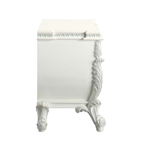  and lustrous finishes are all included in the Vanaheim Bedroom Collection. Extravagant scroll floral design with gold trim accent creates classic appeal and timeless silhouettes. Button tufted headboard and footboard 