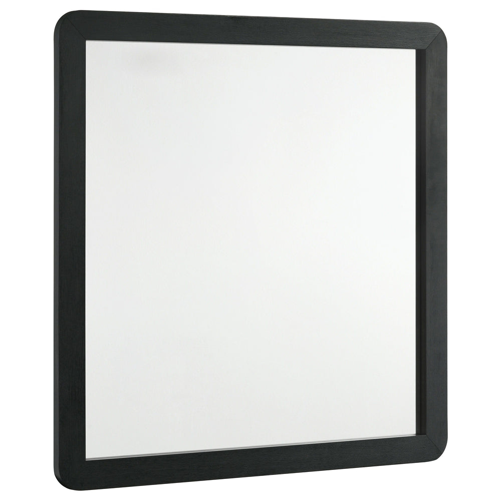 Instill a refined final touch with a modern framed dresser mirror. Its contemporary style is enhanced with a black finish over melamine framing, resisting wear and tear for a chic look that lasts. It features rounded corners on its frame, creating an open