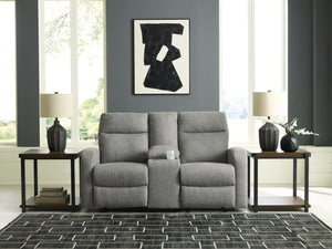  made easy. This reclining loveseat takes you back to the basics with simply stylish comfort. With an easygoing neutral hue and classic design