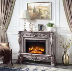 Add warmth and comfort to any room in your home with the impressive Dresden fireplace in a vintage bone white finish. The grand fireplace features floral moldings throughout the piece. Sitting on carved claw feet or added elegance. The fireplace features 