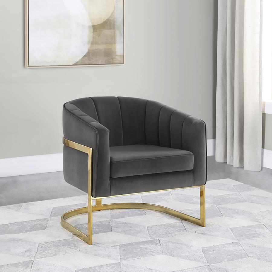 Exquisitely modern and stylish, this bucket chair provides comfort and aesthetic allure. It-'s upholstered with soft velvet that will have you sinking into the padded cushioning. Vertical tufting adorns the backrest for an eye-catching appearance. The bol