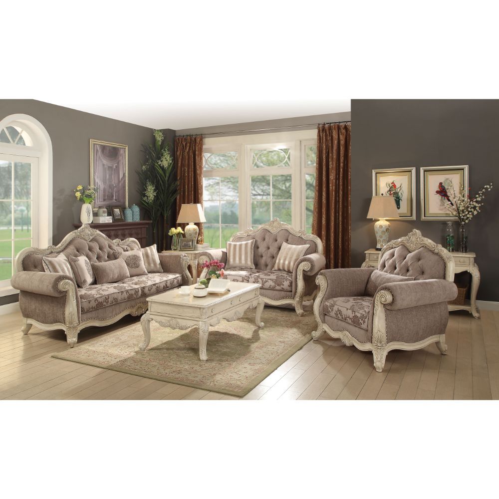 The Ragenardus collection harmonizes traditional details with functional design to accommodate today-'s styles. This sofa set features tight seat and back cushion, crown and raised scrollwork ornamental trim and button tufted backrest. Accent pillows are 