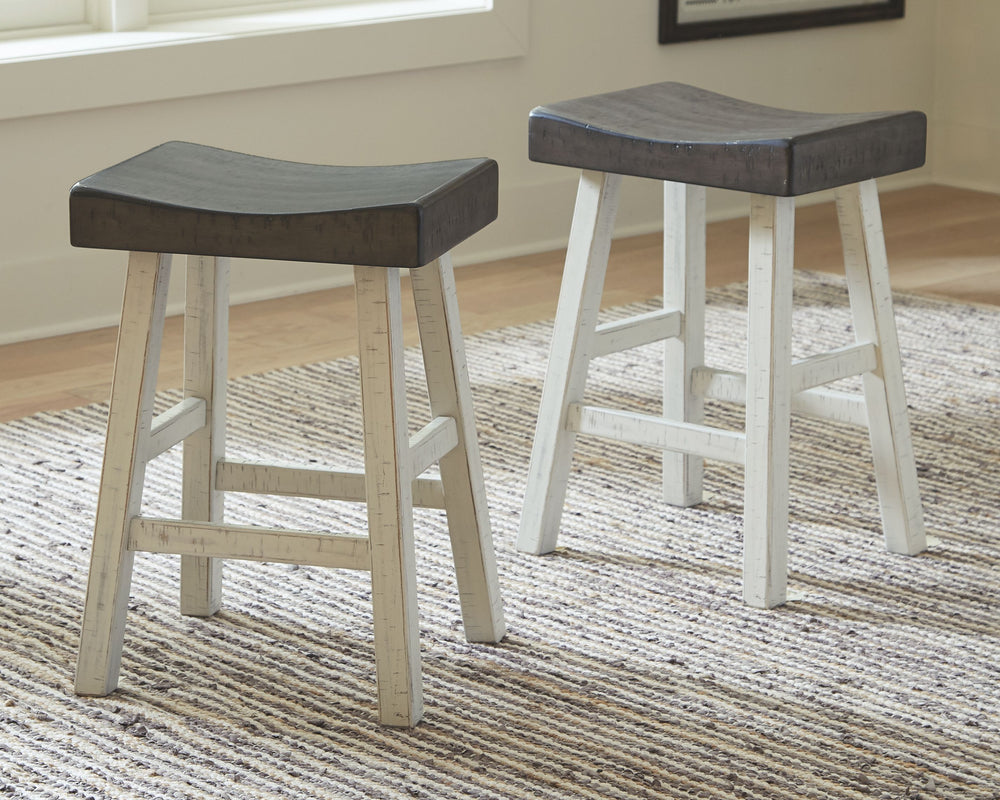 Saddle up and prepare to feast in total comfort and style. This counter height saddle stool-'s deeply scooped seat offers ample support through multiple courses (or rounds of drink). Contrasting finishes elevate the classic shape, creating a look that kee