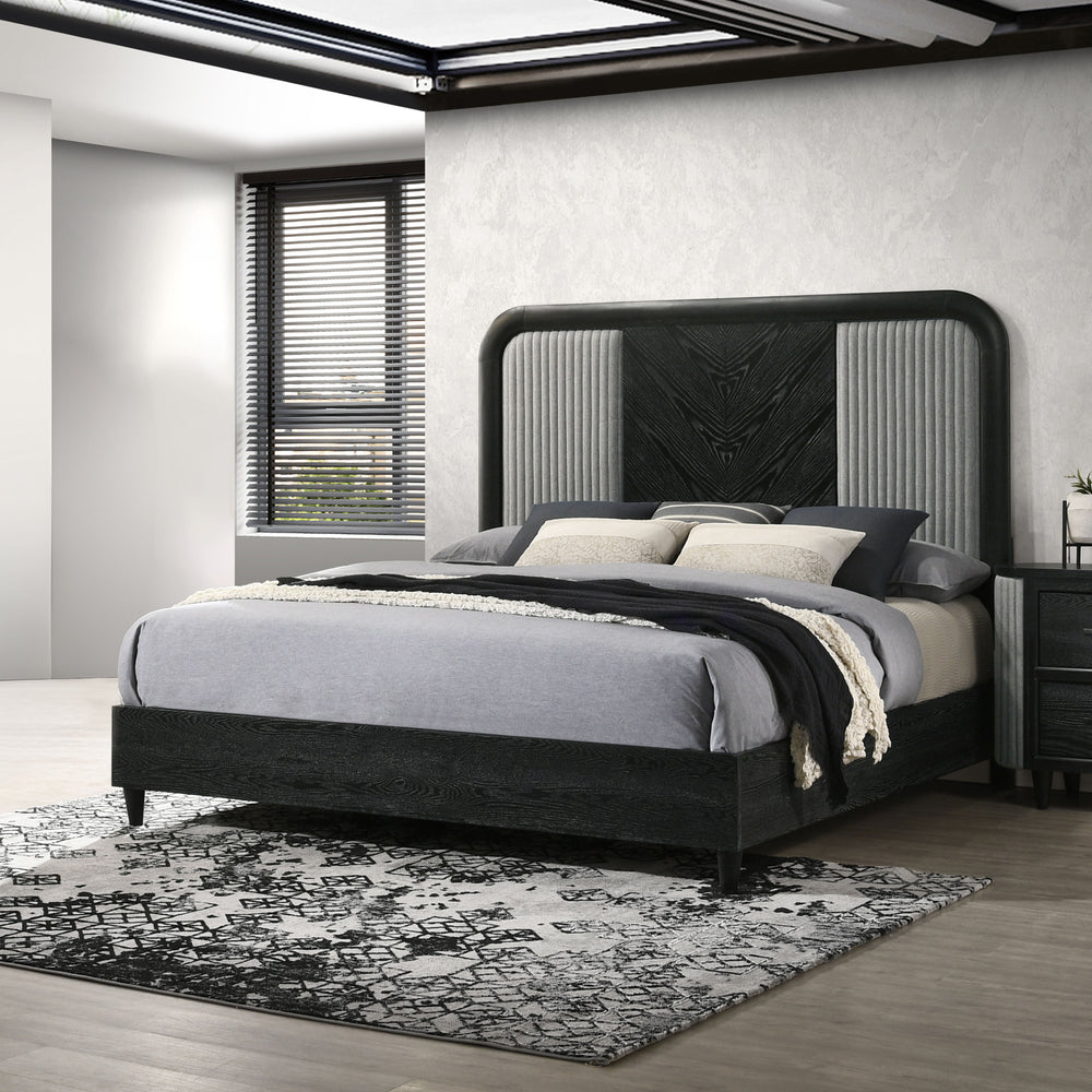 The Skyline Bed in Onyx fuses bold design with durability. Built from solid Rubberwood, engineered woods, and Ash Wood veneers, it withstands the test of time while exuding sophistication. The Onyx Black finish with gray glazing highlights the rich wood g