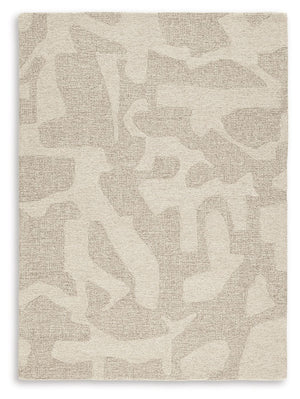 Add an abstract element to your floors. This accent rug effortlessly combines natural linen and taupe hues to create a contemporary aesthetic. Natural wool fibers form a decorative floor covering that complements your luxurious and laid-back lifestyle.<br