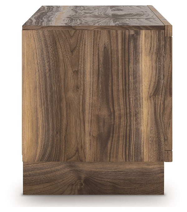  while the angular base incorporates contemporary motifs. Integrate