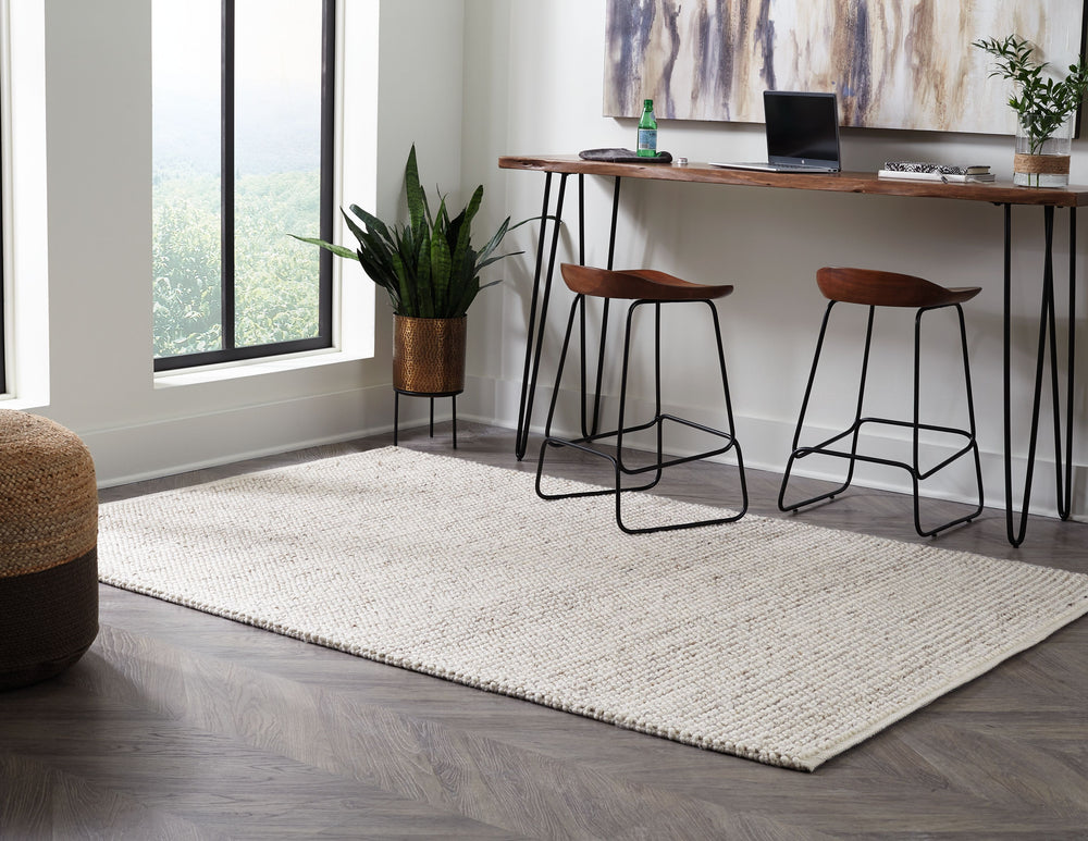 Soft and luxurious underfoot, this area rug is like a precious piece of art for your floor. The handwoven linear design works equally well in formal places and casually cool spaces.<br/><br/><b>Product Features</b><ul><li>Made of wool and polyester</li><l