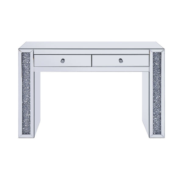 The Noralie Vanity Desk will give any room a touch of glamour. This contemporary desk is fully mirrored with a stunning mirror top and a faux diamond inlay on each leg of its sled base. Use this unique vanity desk for make-up application, jewelry, or as a