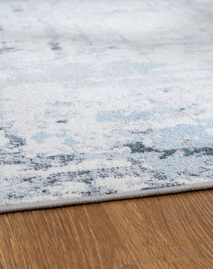  gray and white dance across the plush floor covering