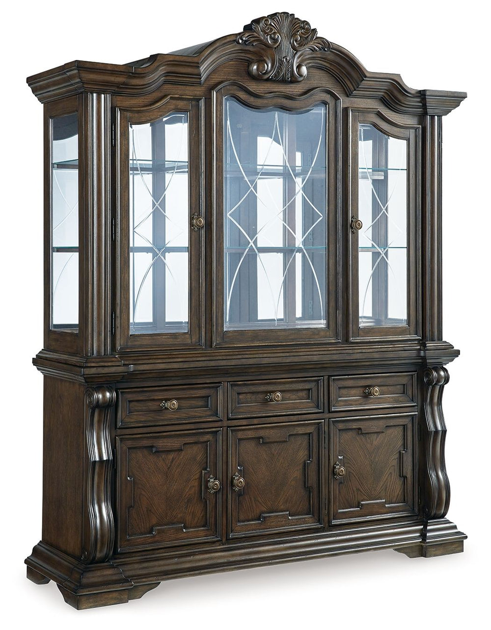 From its ornamental appliques to its large scale, this dining buffet with hutch makes a bold statement. With decorative pilasters, beveled glass windows and plenty of storage, the opulent piece wows with stunning style. The look is timeless. The feel? Rig