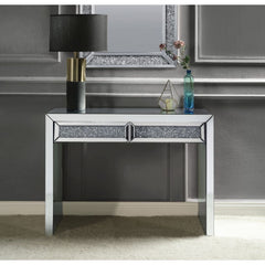 Assembled, Rectangular Console Table Storage: 2 Drawers Features: Mirrored Top, Mirrored Sled Base, Front Drawers w/Faux Diamonds Inlay & Clear Glass (Open Base) CONSTRUCTION: Mirrored Sled-Frame: 4mm Mirror w/Beveled Edge, MDF () Front Drawers: Mirrored 
