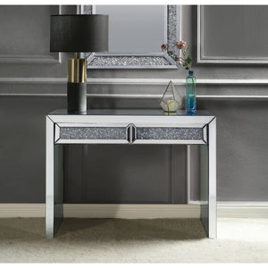 Assembled, Rectangular Console Table Storage: 2 Drawers Features: Mirrored Top, Mirrored Sled Base, Front Drawers w/Faux Diamonds Inlay & Clear Glass (Open Base) CONSTRUCTION: Mirrored Sled-Frame: 4mm Mirror w/Beveled Edge, MDF () Front Drawers: Mirrored 