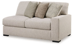 This right-arm facing loveseat is made with polyester upholstery. Pairs with other items in the series to make a sectional.<br><br><b>Additional Dimensions</b><br><ul><li>Arm height: 26-"</li><li>Seat depth: 27-"</li><li>Seat height: 25-"</li><li>Top of c