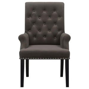  while the addition of padded armrests enhances comfort. Hand-applied nailhead trim o