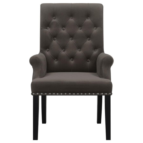  while the addition of padded armrests enhances comfort. Hand-applied nailhead trim o