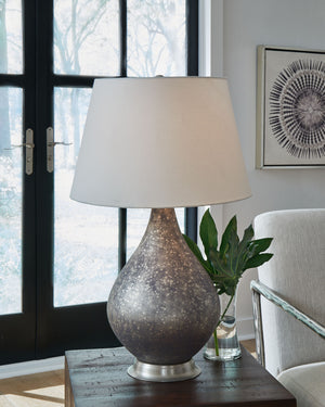  while the traditional silhouette keeps it classic. Crafted of mercury glass