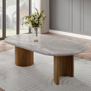 The Darcy dining set features a stunning oval marble top, offering a luxurious touch to your dining space. Supported by elegant double pedestals, this fixed table top exudes both strength and style. Paired with padded seat and back cushion side chairs, th