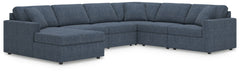 Looking cool and contemporary is great. But when it comes down to it, youâ€™re all about low-maintenance lounging. With the performance fabric on this sectional with chaise, cleaning spills is a breeze. And its customizable modular design caters to your e