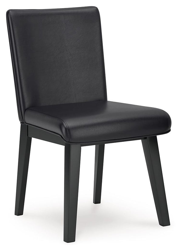 This dining chair exudes modern sophistication. Finished in a sleek black wood-tone with black faux leather upholstery for added comfort and style, it brings a beautifully balanced look to the table. A simply striking feast for the eyesâ€”now your only wo