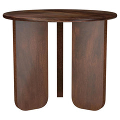 Instill an organic sense of artistry in your living space with this beautifully crafted end table. Made from solid mango wood, it features a deep brown finish that highlights the natural wood grain for added character. The round tabletop provides a stylis