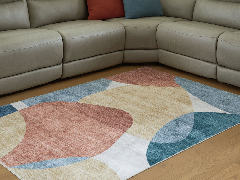 Contemporary hues and a modern design give this rug loads of cool character. Ground your space with artistic flairâ€”its dynamic abstract pattern and faux fur construction bring style and softness underfoot. When itâ€™s time for a refresh, simply toss it 