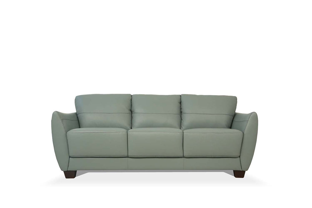 The Valeria sofa set is one youâ€™ll want to spend lots of time in. This beautiful mustard or watery leather sofa features same tone stitching and unique wood block legs. Its deep, comfy seat and flared padded arms give it an incredible sink-right-in qual
