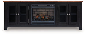 Raise the bar on modern farmhouse style with this TV stand with electric fireplace. Its sturdy silhouette and casual good looks are accentuated with a two-tone finish, which pairs a warm satin black base with a contrasting butcher block veneer top. Glass 