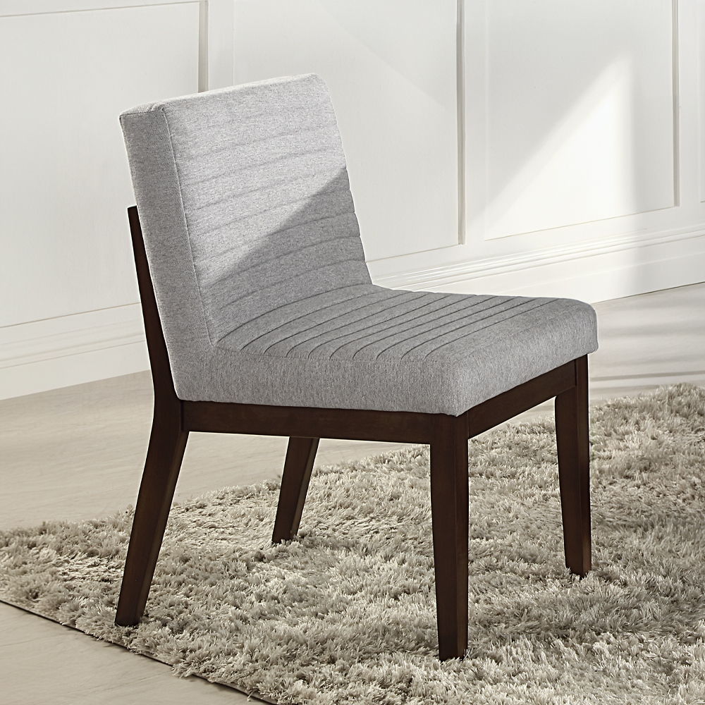 Edwyn dining set featuring a pristine white marble top and a rich brown finish, is the epitome of elegance and sophistication. Its sturdy double U-shaped base provides a modern touch, while the padded seat and back cushion chairs ensure comfort for every 