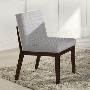 Edwyn dining set featuring a pristine white marble top and a rich brown finish, is the epitome of elegance and sophistication. Its sturdy double U-shaped base provides a modern touch, while the padded seat and back cushion chairs ensure comfort for every 