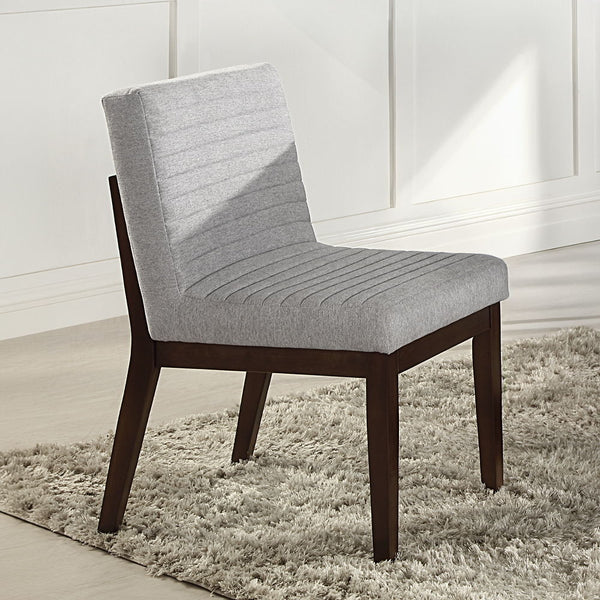 Edwyn dining set featuring a pristine white marble top and a rich brown finish, is the epitome of elegance and sophistication. Its sturdy double U-shaped base provides a modern touch, while the padded seat and back cushion chairs ensure comfort for every 