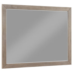 Enhance your bedroom-'s style and functionality with this modern dresser mirror. The sleek frame, finished in a barley brown wood grain, complements any decor while adding a touch of organic warmth. This mirror is perfectly sized to sit atop a dresser, of
