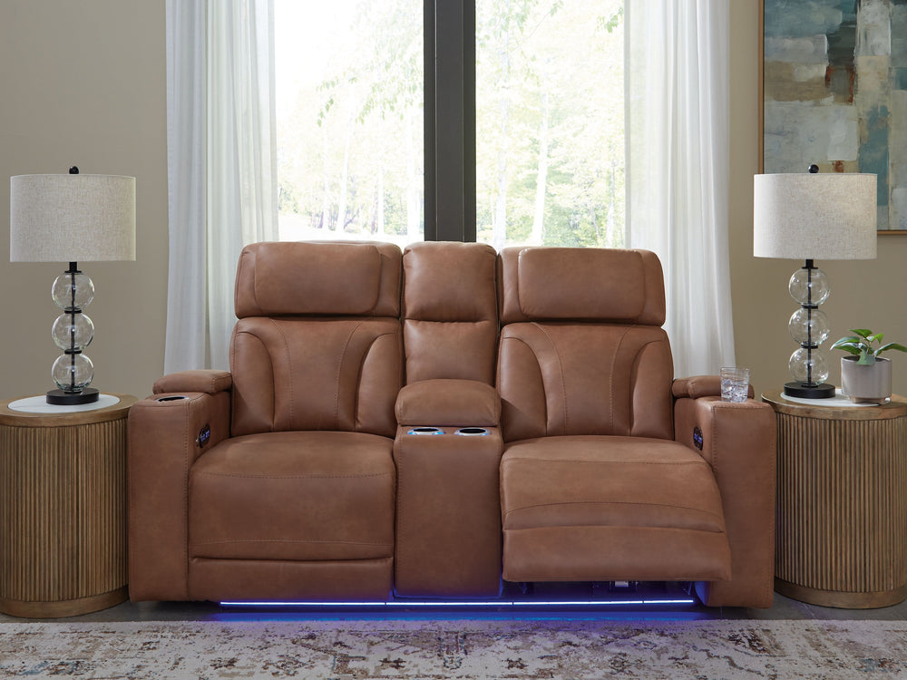 Ready to relax in style? Our luxurious power reclining loveseat doesn-'t just look fantasticâ€”it also delivers creature comforts and fabulous functionality. Adjustable headrests ensure a perfect TV view no matter how far back you recline. Faux leather up