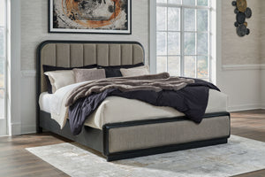  this softly shaped king upholstered panel bed makes a lasting impression in a simply stunning way. Its magnificent curved silhouette is enhanced by a rich layered black finish on the textured wood grain surface. The channeled 