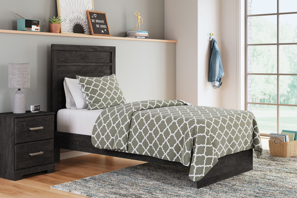 With its clean-lined look and modern attitude, this twin panel bed is a fresh style awakening. A warm charcoal hue over replicated oak grain easily complements other furniture finishes. The simple, unadorned profile is given depth and dimension with the a