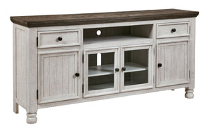 Have your fill of modern farmhouse style with this TV stand. Its distressed two-tone finish pairs a vintage white with a weathered gray for a look thatâ€™s utterly charming. Right and left cabinets open to reveal adjustable shelving for all your entertain