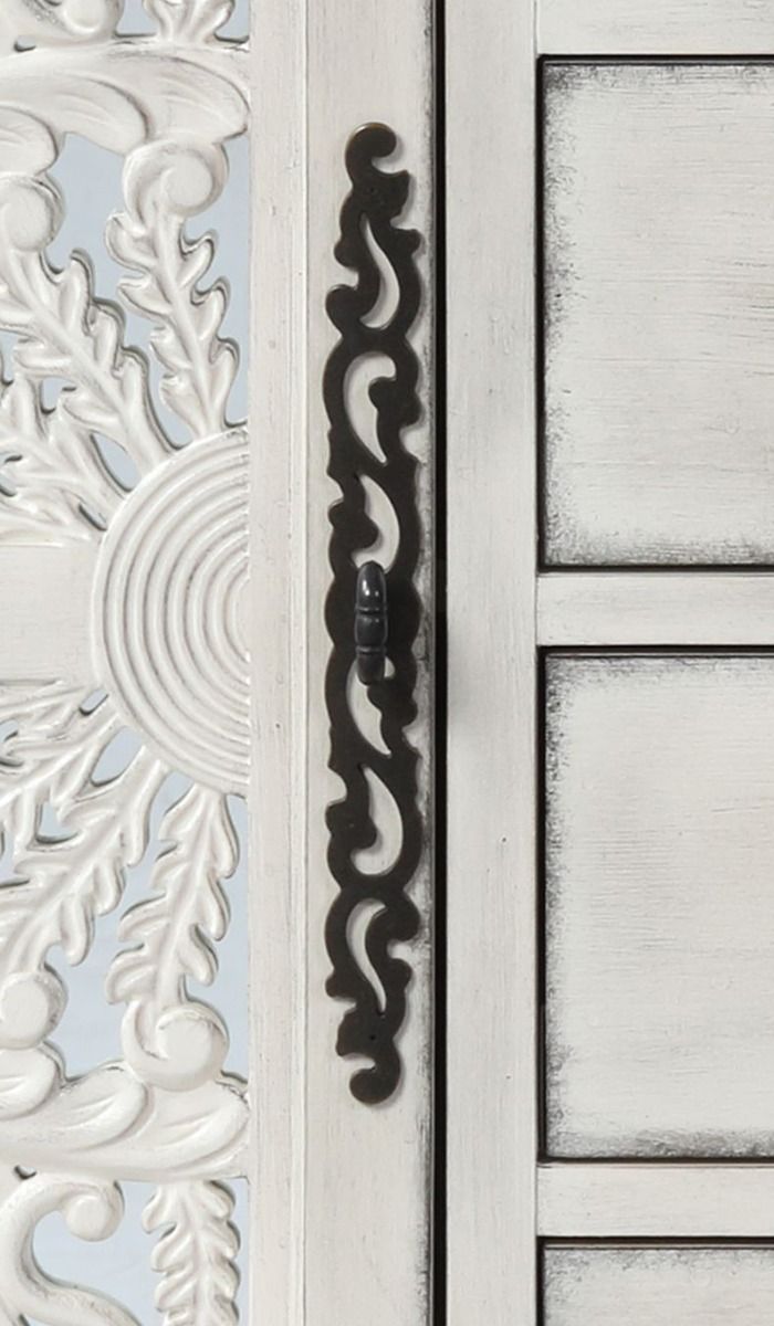 The elegant Vernon Console Table features an antique white finish with decorative cabinet door inlays. The rectangular wood console table features 4 center drawers and 2 doors on each end that reveal 4 additional shelves, providing ample display and addit