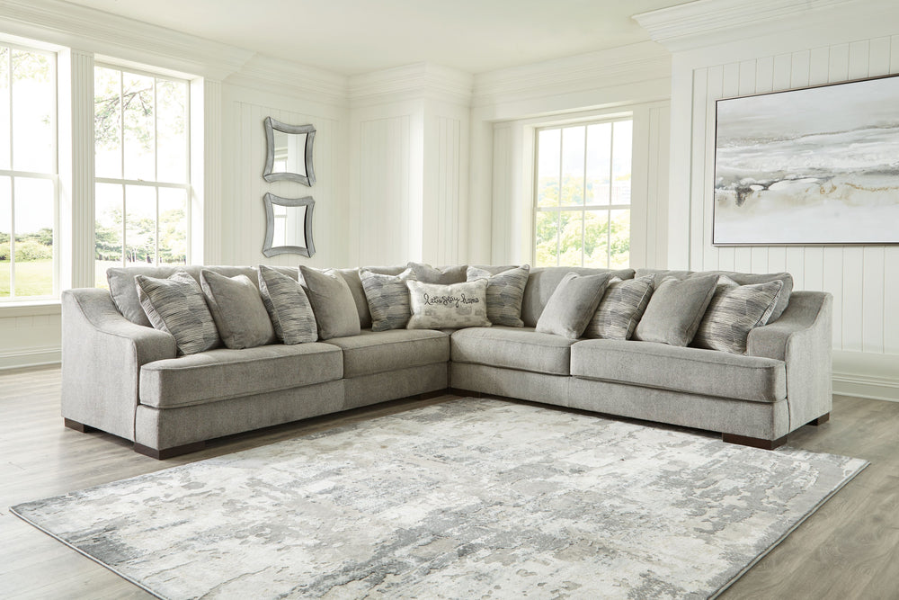 Get a leg up on comfort with this sectional. Sumptuously soft smoke gray upholstery welcomes you with open arms. A versatile performer, this stylish sectional steps in as a contemporary spot for impromptu entertaining. <h4><b>Bayless - Smoke - LAF Sofa</b