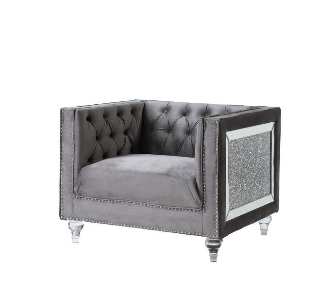 Impressive and bold, the Heiberoll living room collection is sure to impress your guests. The set includes mirrored side trim with faux diamonds to add a glimmering touch. The whimsical acrylic turned legs give off the illusion that the pieces are floatin