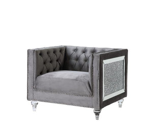 Impressive and bold, the Heiberoll living room collection is sure to impress your guests. The set includes mirrored side trim with faux diamonds to add a glimmering touch. The whimsical acrylic turned legs give off the illusion that the pieces are floatin