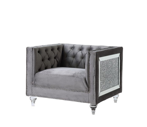 Impressive and bold, the Heiberoll living room collection is sure to impress your guests. The set includes mirrored side trim with faux diamonds to add a glimmering touch. The whimsical acrylic turned legs give off the illusion that the pieces are floatin