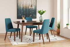 Subtle in design, this dining set is casual, yet timeless. The table invites the eye with a sleek, open frame and has a self-storing extension leaf. The chairs are a refreshed take on retro aesthetics and add an air of playful simplicity to your dining sp