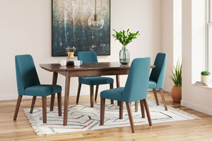Subtle in design, this dining set is casual, yet timeless. The table invites the eye with a sleek, open frame and has a self-storing extension leaf. The chairs are a refreshed take on retro aesthetics and add an air of playful simplicity to your dining sp