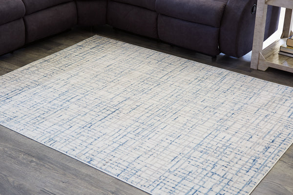  this accent rug brings refined simplicity to any space. Its woven grid design