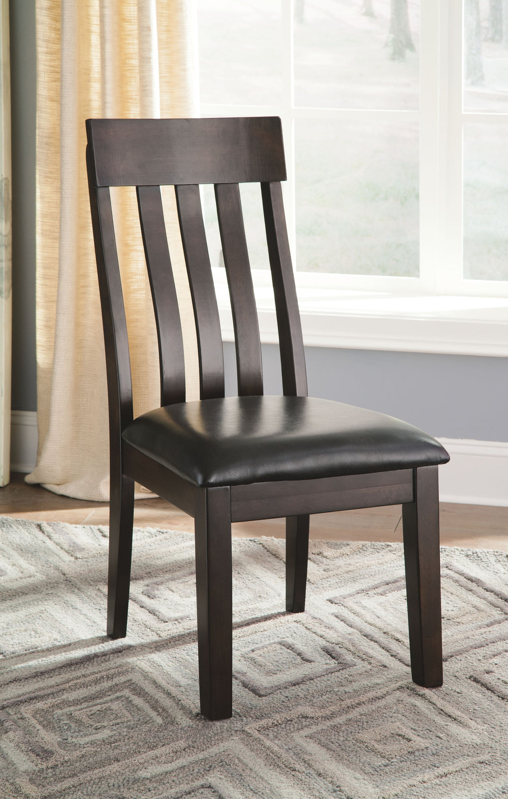 Made with select Oak veneers and hardwood solids with a dry smoky dark brown oak color. Edges and corners have a rounded off, worn effect for a casual look. Server has fully finished drawer boxes with ball bearing side guides. Sturdy looking knobs have de