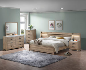 This bedroom collection brings a breath of fresh air to any interior with its light, natural wood finish that evokes a sense of calm and simplicity. The well-crafted bed frame, with its clean lines and subtle headboard design, provides a modern rustic cha