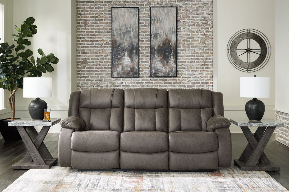 This living room set tees you up to catch up on streaming or enjoy the latest game without breaking the bank. Its easy reclining motion and inviting stitched details craft a stylish seat that keeps you utterly at ease. <h4><b>First Base - Gunmetal - Recli