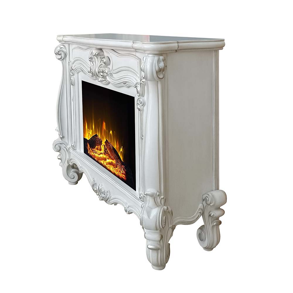 Gather the family around the Versailles fireplace in bone white. Traditional details such as scroll legs and carvings make this piece a masterpiece. It comes equipped with fire safety technology that continuously monitors the temperature of the plug and w