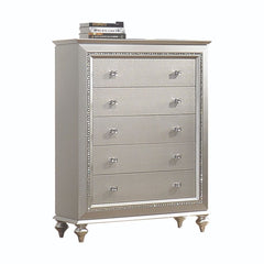 The Kaitlyn chest provides a commanding presence in any room. Crafted with a transitional look that is an ideal addition to any bedroom, the chest is accented with textured front and a crystal-like sparkling trim. Its crystal-like trimming creates dazzlin